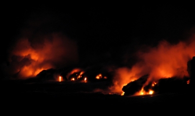 Lava flows from Kilauea Volcano entering the Pacific Ocean