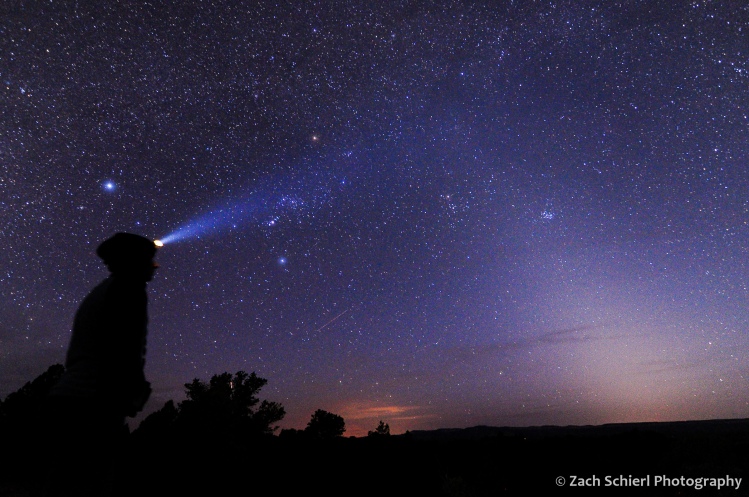 Photo of the spring night sky with zodiacal light and Orion